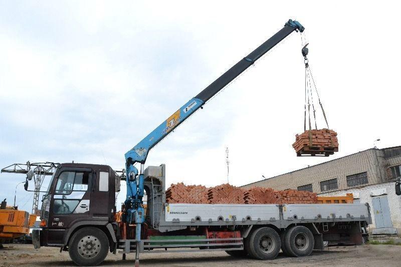 Манипулятор или кран? Что выгоднее для разовой разгрузки фуры на объекте